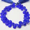 This listing is for the 53 pcs of Ink Blue Chalcydony faceted Pear briolettes in size of 8x10 mm approx,,Length: 8 inch,,Total Pcs: 53